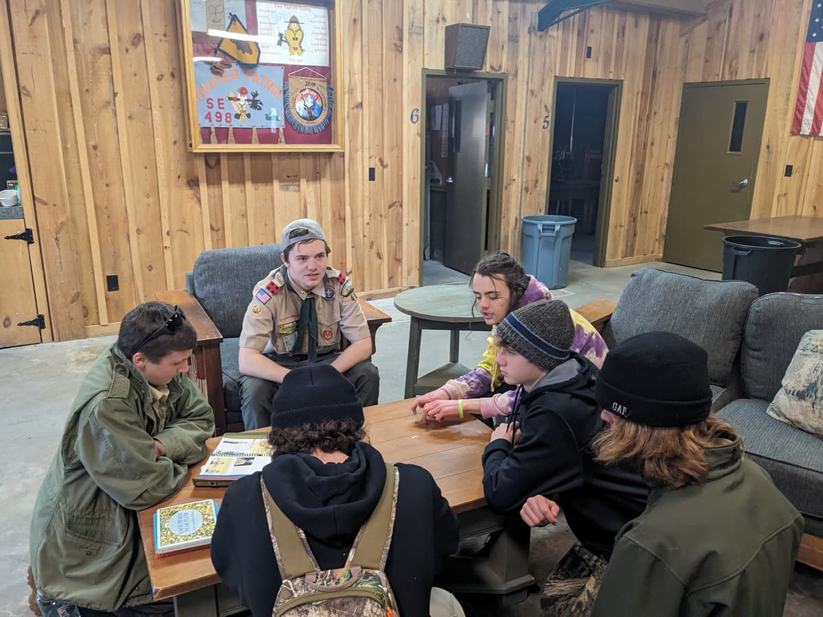 Scouts around a table